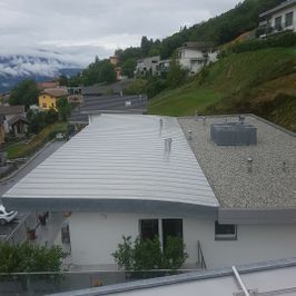 Couverture de toit plat en Eternit et gravier